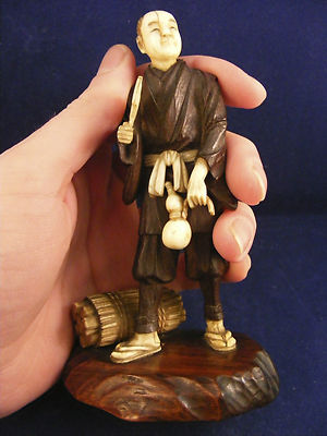 antique okimono of a man, carved ox bone, wood, pearl, shibayama, signed, FINE.