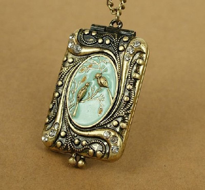 Antique Bronze Bird album Locket Pendants Necklace.