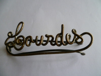 Antique lourdes insigne.