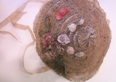 Antique straw Doll Bonnet/ Hat Lined and all original, millinery flowers,ribbon.