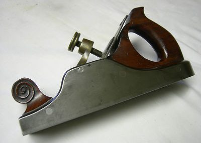 Quality antique infilled bench plane with Ward cutter.