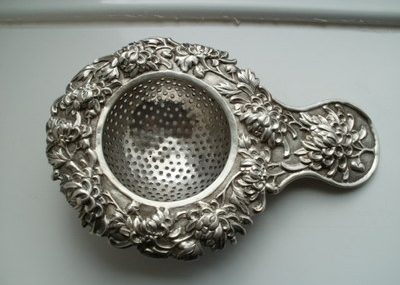 Rare Luen Wo…Shanghai Antique Chinese silver repousse Carnations tea strainer.